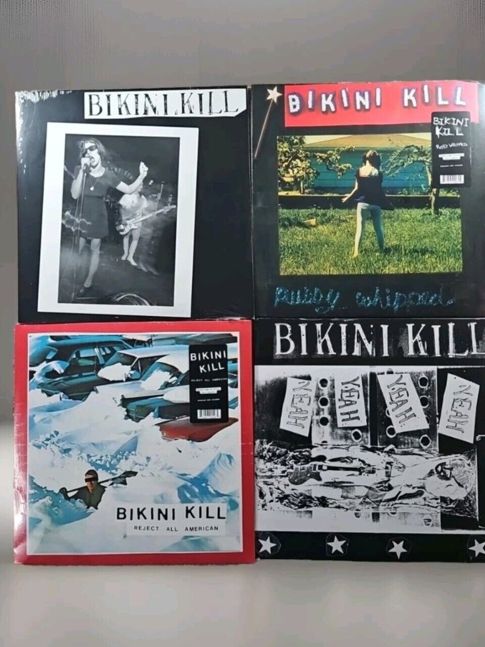 Lot of 4 Bikini Kill Records (New): S/T, Reject All American, Yeah Yeah Yeah Yea